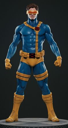 an action figure is shown in blue and yellow with his hands on his hipss