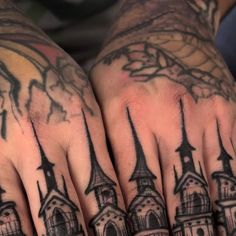a person with tattoos on their hands and the image of a church is painted on his hand
