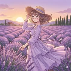 a girl in a lavender field wearing a hat