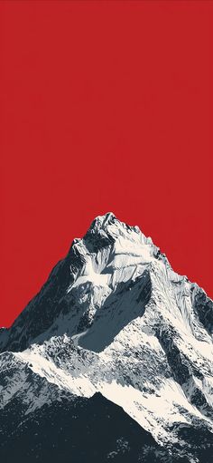 a red and black mountain with snow on it