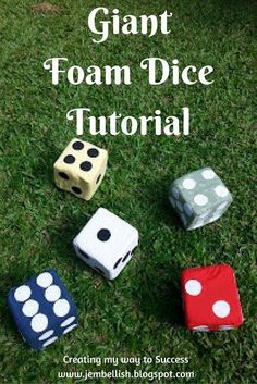 four dices sitting in the grass with text overlay that reads giant foam dice tutor