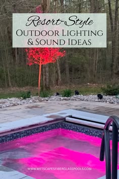 Spa pool with pink LED lighting, modern square design, and illuminated landscape for resort-style outdoor ambiance