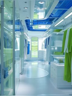 a white and blue room with lots of clothes on shelves, closets and cabinets