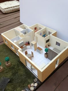 a doll house with all the furniture and accessories in it's own backyard area