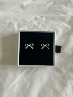 Silver Jewellery Aesthetic Earrings, Cute Silver Earrings Aesthetic, Girly Jewelry Silver, Silver Stud Earrings Aesthetic, Chanel Heart Earrings Silver, Bow Earrings Aesthetic, Coquette Silver Jewelry, Pandora Bow Earrings, Silver Girly Jewelry