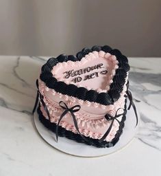Elegant Heart Cake Design, Heart-shaped Birthday Cake With Pink And Black Frosting, Heart-shaped Cake For Celebrations, Pink And Black Birthday Cake, Light Pink And Black Heart Cake, Pretty Heart Shaped Cakes, Black Heart Cake Ideas, Black And Pink Bow Cake, Pink Black And White Cake