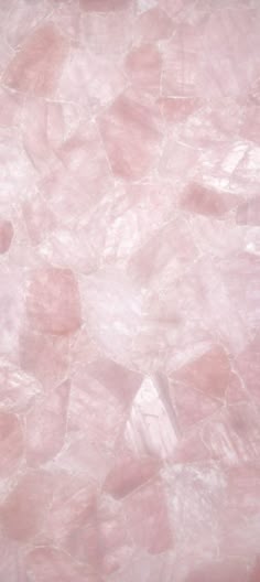 pink marble textured background with small rocks
