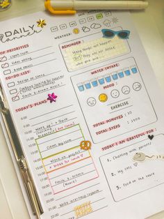 the daily planner is sitting on top of a desk