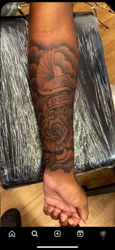 a person with a tattoo on their arm