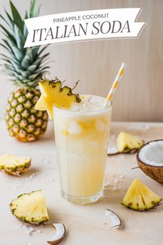 pineapple coconut italian soda in a glass next to sliced pineapples