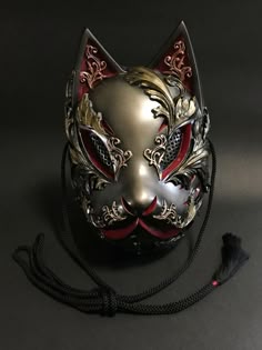 Dark Kitsune Mask, Black Kitsune Mask, Kitsune Mask Black, Black And Blue Kitsune Mask, Kitsune Masquerade Mask, Metal Fox Mask, Intricate Fantasy Mask Design, Steampunk Therian Mask, Black And Gold Kitsune Mask