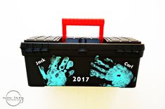 a tool box with hand prints on it