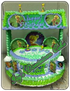 a birthday cake with the theme of disney's princess and the frog on it