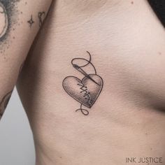 a woman's chest with a tattoo on it that says i love you in cursive writing