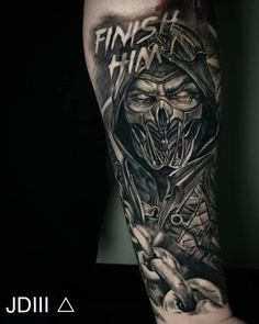 a man's leg with a black and grey tattoo on it that says finish that