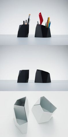 three black and white objects on shelves with pens, pencils, scissors and markers