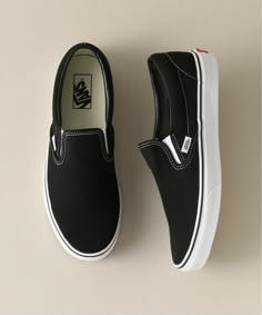 Slip-on Vans Sneakers, Vans Classic Slip, Vans Classic Slip On Black, Classic Slip-ons With Vulcanized Sole For Streetwear, Vans Slip-on Canvas Shoes, Casual Black Vans Slip-on Sneakers, Vans Slip-ons Casual Wear, Black Slip-on Vans Sneakers, Black Vans Slip-on Sneakers