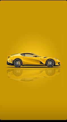a yellow sports car on a reflective surface