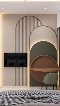 a bedroom with a bed, desk and television on the wall next to each other