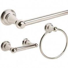 an image of two towel rings and toilet paper roll holder in polished chrome finish on white background
