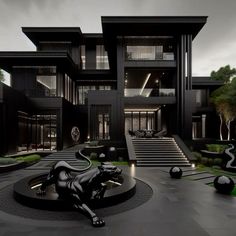 a large black building with stairs leading up to it and a statue of a lion in front