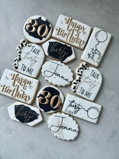 decorated cookies with the words happy birthday and age are arranged on top of each other