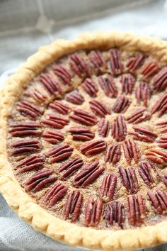 a pecan pie is sitting on a table