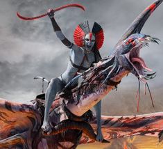 a woman riding on the back of a dragon