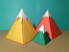 two origami mountains sitting next to each other