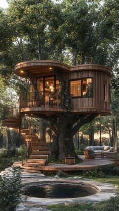 a tree house built into the side of a large tree in front of a pool