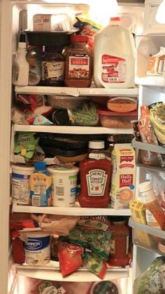 an open refrigerator filled with lots of food