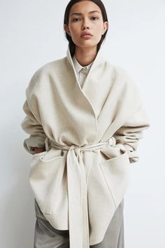Beige Wool Coat Fashion, Oversized Beige Outerwear With Belted Cuffs, Beige One Size Wool Outerwear, Oversized Beige Wrap Outerwear, Beige Belted Long Sleeve Outerwear, Beige Double-breasted Wool Coat For Winter, Oversized Beige Cashmere Outerwear, Wool Kimono Coat, Luxury Beige Wool Outerwear