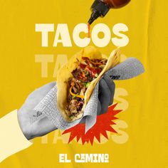 a taco being drizzled on top of another taco in front of a yellow background