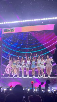 girls'generation performing on stage at an event