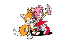 sonic the hedgehog and tails playing with each other in front of a white background