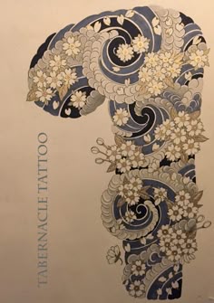 an intricately designed piece of paper with flowers and swirls on the bottom half of it