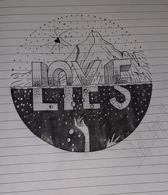 a drawing of the word love is written on a piece of paper