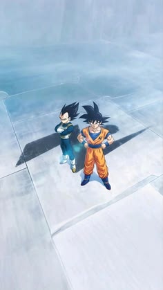 two young boys are standing in front of an ice - covered area, one is holding his arm around the other's neck