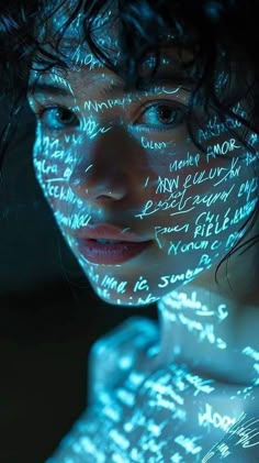 a woman's face is covered in words