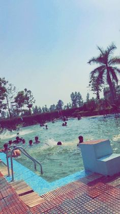 many people are swimming in the pool with no one around or on their feet,