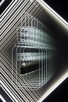 an abstract image of a birdcage in the dark