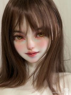 a doll with long brown hair and green eyes