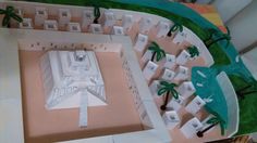 a model of a city with palm trees