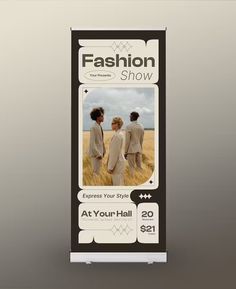 a roll up banner for fashion show with three women standing in a field and talking