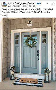 a blue front door with two wreaths on it and the words home design and decor john does anyone love this as much as i do it's called