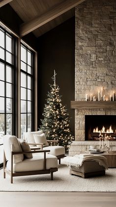 a living room filled with furniture and a fire place next to a christmas tree in front of a large window