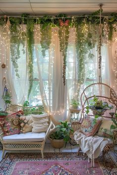 a living room filled with lots of plants and hanging lights on the wall next to two wicker chairs