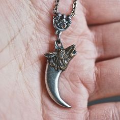 The Werewolf's Claw Necklace  Wolf Head Charm by blackpersimmons, $24.00 Wolf Claw Necklace Meaning, Wolf Claw Necklace, Werewolf Accessories, Werewolf Jewelry, Wolf Claw Keychain Necklace, Werewolf Themed Jewelry, Wolf Claw Amulet, Wolf Fang Jewelry, Werewolf Necklace