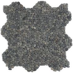 a large group of rocks arranged in the shape of a snowflake on a white background