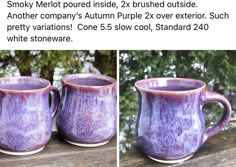 two purple mugs sitting next to each other on a wooden table with trees in the background